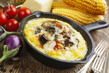 Polenta baked with vegetables and cheese