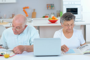 elderly couple apart