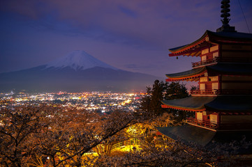 Fototapeta na wymiar Red pagoda with Mt. Fuji as the background