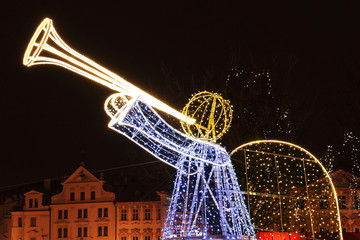 Fototapeta na wymiar Christmas Mood on the night snowy Old Town Square, Prague, Czech Republic