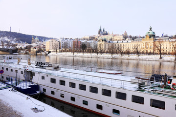 Christmas snowy Prague gothic Castle above River Vltava, Czech Republic