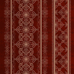 Filigri golden lace border on red brown.