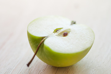 Half of green apple