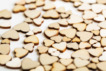 background of wooden little hearts