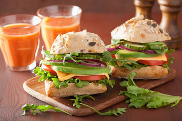 tomato avocado cheese sandwich with cucumber onion