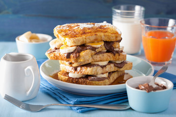 french toasts with banana chocolate sauce and caramel for breakf