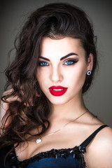 Fashion close up portrait of young model with beautiful make up 