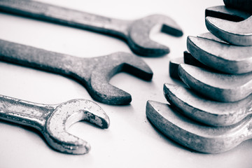 wrenches on a metal background
