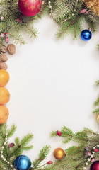 Christmas frame with Christmas ornaments and decorations.tangerines, cloves