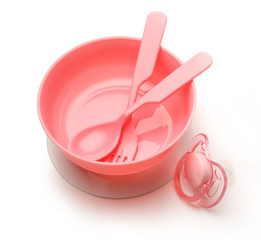 Bowl, pacifier and spoon for baby