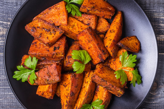 Homemade Cooked Sweet Potato with spices and herbs.