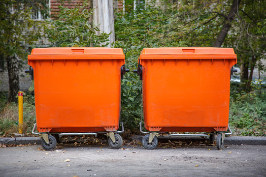 Orange garbage bins