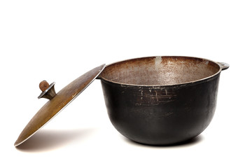 Open old black pot with lid