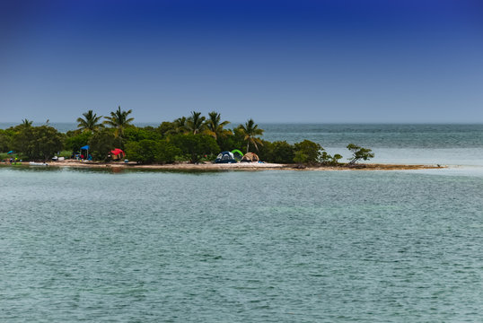 Caribbean island along famous Seven Mile Bridge to Key West. Tropical Paradise in turquoise sea water with sandy beach, perfect for holiday trips and bbq with camping