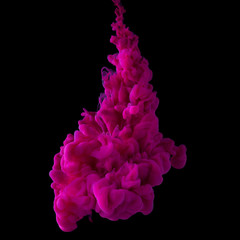 Pink ink cloud in water isolated on black