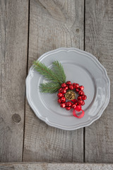 Christmas table place setting with christmas pine branches, decorations. Christmas holidays background.  Top view with copy space. Christmas menu concept.