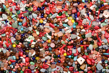 Fototapeta na wymiar Random colorful natural stone and wooden beads mix
