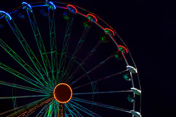 Colourful ferris wheel on Christmas market in Erfurt, Germany.
