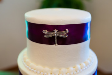 Tall Wedding Cake With Brooches