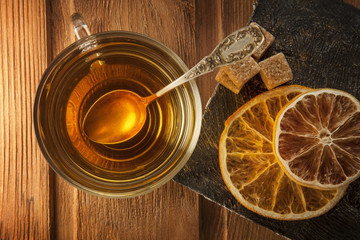 tea sweet sugar on wooden table (top view)