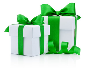 Two gift white boxs tied green ribbon bow Isolated on white back