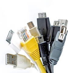 Bunch of computer cables with sockets isolated on a white background. USB cables. LAN cable