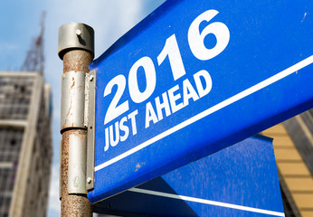 2016 road sign with urban background