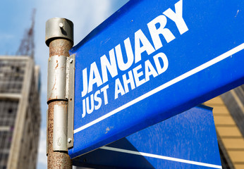 January road sign with urban background
