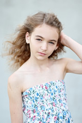 Fototapeta premium portrait of little girl outdoors in summer