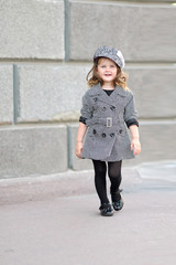 portrait of little girl outdoors in summer