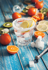 Refresh drink with ice and citrus assorted fruits