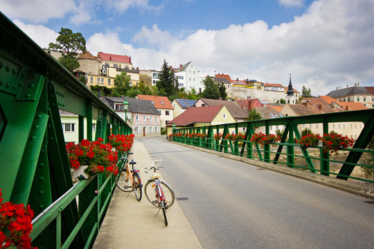 Cityscape of small pretty European town. A view on Waidhofen an der Thaya bridge with two bicycle on it, Austria.