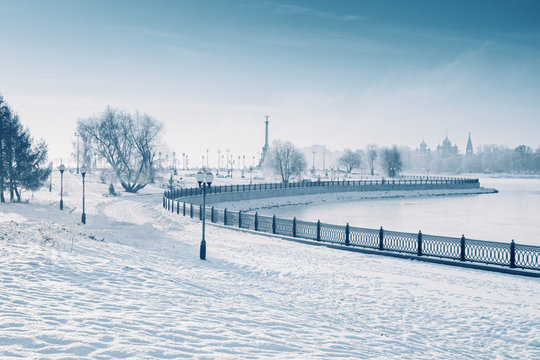 Embankment winter snow. Footprints in snow