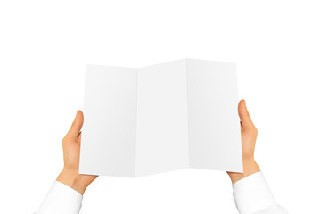 Hand holding blank brochure booklet in the hand. 