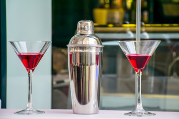 Cocktail shaker glass with liquor
