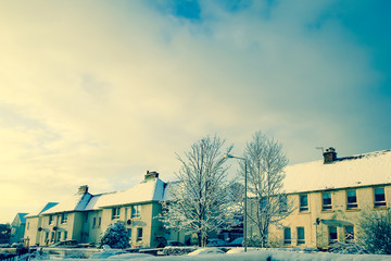 Beautiful winter landscape with houses covered with snow