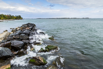 Waves Crash against a Rockwall