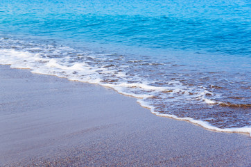 Wave of the sea on the beach