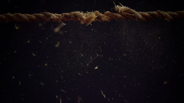 Tension of a Panic Attack Illustrated with Breaking Rope in Super Slow Motion