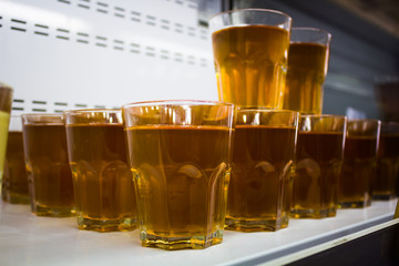 Fruit juice in a glass on the counter