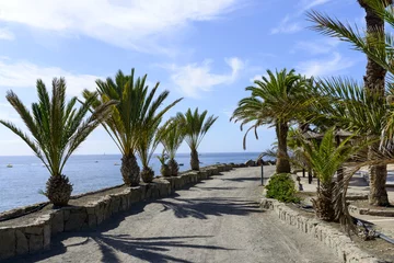 Fototapete Promenade along the Atlantic ocean beach in Taurito, Gran Canaria Island. © Piotr Pawinski