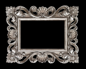 Vintage silver baroque style picture frame isolated over black