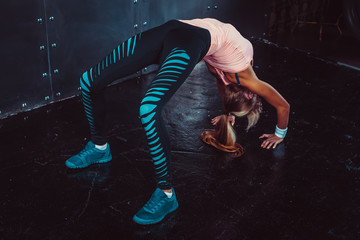 Bridge pose sporty woman doing fitness workout yoga stretching gymnastics exercise
