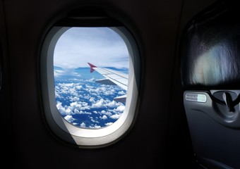 Naklejka premium Airplane window seat with view