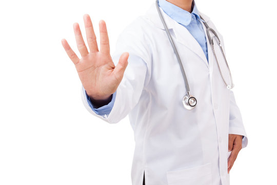 Hand of doctor showing warning sign