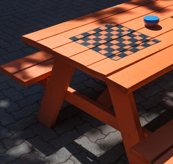 Empty picnic table in street