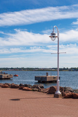 Street light at coast with diving platforms in the background, Prince Edward Island, Canada