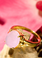 Pink jade gold ring with beautiful background