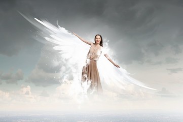 Angel girl flying high