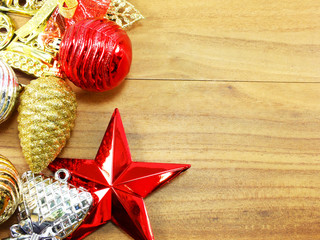 merry christmas and happy new year with colorful decoration on wooden background